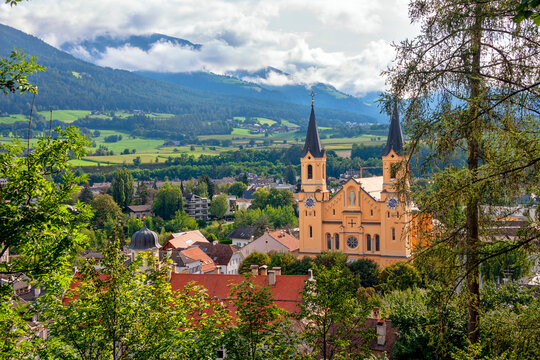 Church of the Assumption of Mary in the old town of Brunico (Bruneck), South Tyrol, Italy. Top view of the historic center of the old city.
