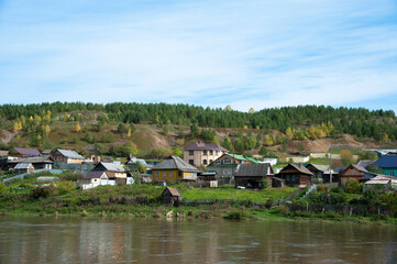 Fototapeta na wymiar village landscape on a warm sunny day
