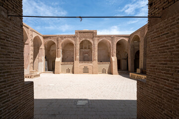 Yazd, Iran - 13.04.2019: Courtyard of the historical Jameh Mosque of Naein, Yazd province, Iran. Very old islamic architecture.