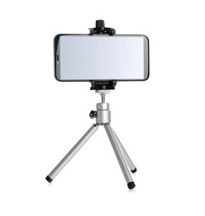 Smartphone with blank screen fixed to tripod on white background, mockup for design