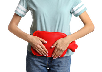Woman using hot water bottle to relieve menstrual pain on white background, closeup