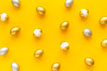 Silver and golden Easter eggs. Easter decoration, top view