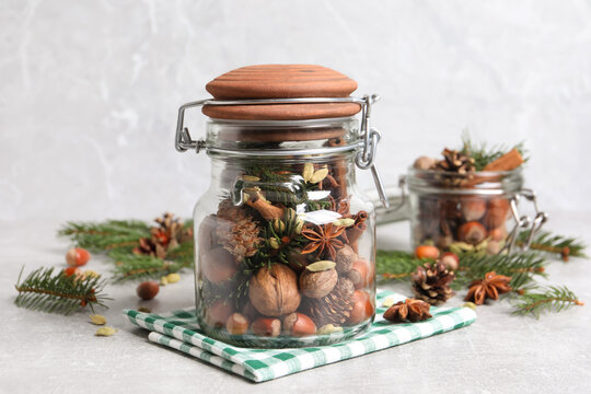 Aromatic Potpourri In Glass Jar On White Table