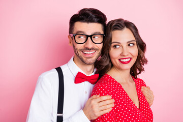 Photo of nice optimistic brown hair couple hug look empty space wear trend cloth isolated on pastel pink color background