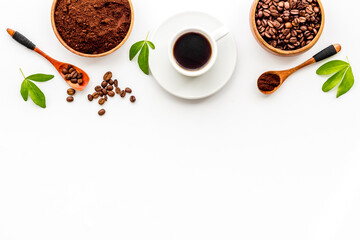 Coffee background. Coffee beans and hot drink, top view