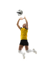 In jump. Young female volleyball player isolated on white studio background. Woman in sportswear...