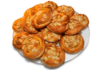 freshly baked almond rolls, round sweet bread isolated on white background