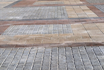 background fragment of the city square, paved with tiles
