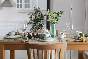 Beautiful Easter table setting with festive decor indoors
