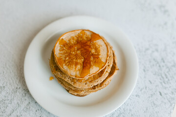 gluten free homemade pancake with honey closeup photo 