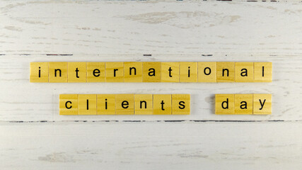 International Client's Day.words from wooden cubes with letters
