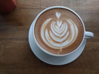 Wing Tulip latte art is the first coffee cup in the morning.