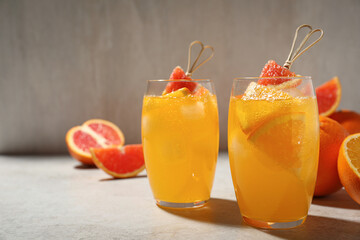 Delicious orange soda water on light table