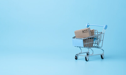 Isolated of Shipping paper boxes blue background and copy space , Online shopping and e-commerce...