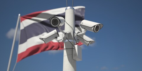 Naklejka na ściany i meble Outdoor security cameras near flag of Thailand. 3d rendering