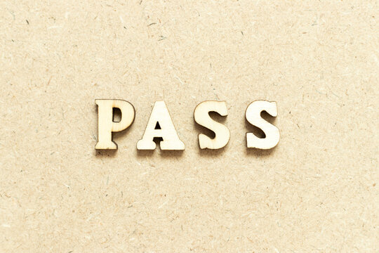 Alphabet letter in word pass on wood background