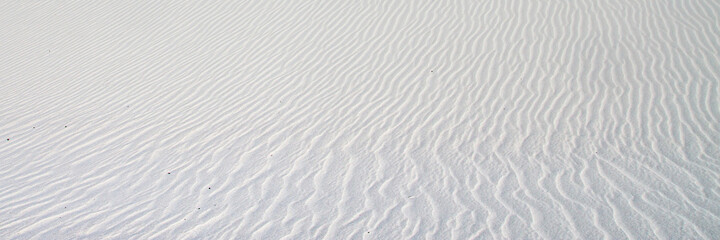 the texture of white sand in the desert