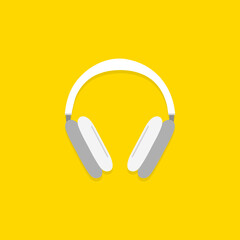 Fototapeta na wymiar Wireless headphones on yellow background.