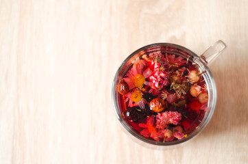 Close up photo of cup of hibiscus tea on the table in the morning