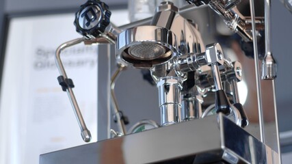 Fototapeta na wymiar Details of one group home manual espresso coffee machine. Shower screen shot from a low angle. high-quality photo. 