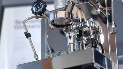 Details of one group home manual espresso coffee machine. Shower screen shot from a low angle. high-quality photo. 