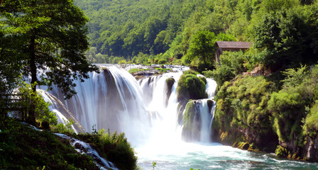 Fototapeta na wymiar amazing waterfall in wilderness forest