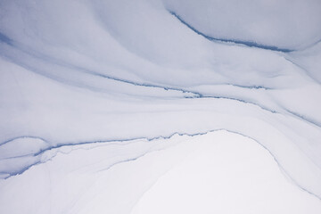 Artistic background that applicable for design cover, poster, brochure. Modern art. Marble texture. Natural pattern. Ink colors are amazingly bright. Alcohol ink sea texture. Contemporary art.