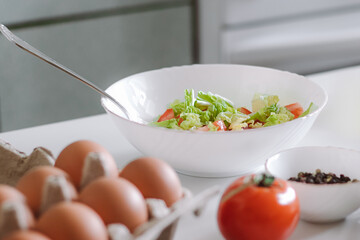 Vegetable salad for a healthy diet. Cooking dietary meals at home.