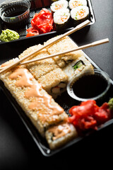 Sets of sushi to go. Sushi in plastic containers lifestyle.