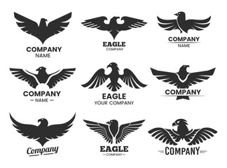 Set of black heraldic eagle heads and wings
