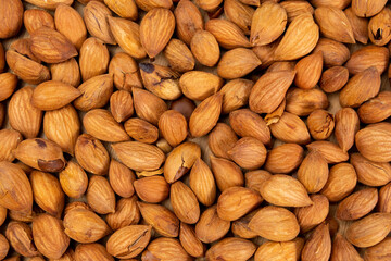 Apricot pits for the manufacture of tablets and drugs. background texture. close up