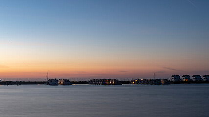 Der Hafen im Schleswig-holsteinische Ferienort Olpenitz  bei Sonnenuntergang oder Sonnen Aufgang
