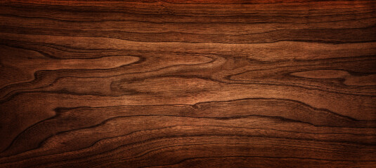 Walnussbaum Textur hautnah. Breiter Nussbaum-Holz-Textur-Hintergrund. Walnussfurnier wird in luxuriösen Oberflächen verwendet.