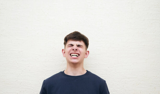Screaming with indignation emotion portrait of man