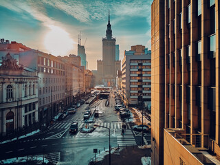 Beautiful panoramic aerial drone skyline sunset view of the Warsaw City Centre with skyscrapers of the Warsaw City and Palace of Culture and Science (Polish: PKiN), Poland, EU