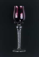 vintage wine glasses isolated on black background