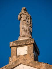 Fototapeta na wymiar mother mary at Galileo Village Church, Mallorca, spain