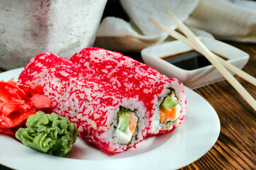 sushi rolls in masago caviar