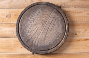 Pizza or bread cutting board for homemade baking on wooden table. Food recipe concept