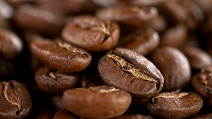Falling Roasted Coffee Beans, Macro Shot, close-up.