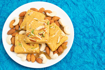 Indian Mithai Lachedar Patisa With Various Names Soan Papdi San Papdi Sohan Papdi Sukhdi Or Sonpapdi Son Roll Is Made Of Gram Wheat Flour Besan Kaju Pista Badam Dry Fruits Jaggery Fried In Desi Ghee