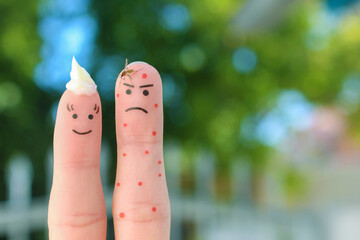Fingers art of couple. Concept of man being bitten by mosquito and woman is anointed with protective cream.