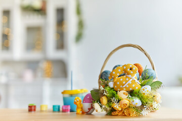 Happy Easter Background with colorful eggs in basket.