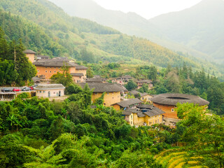 Fototapeta na wymiar Landscape of Tianluokeng tulou cluster,located in Nanjing town,Fujian,China