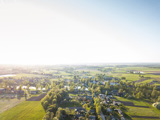 Clear Blue Sky with Copy Space, over Green Meadows and Trees