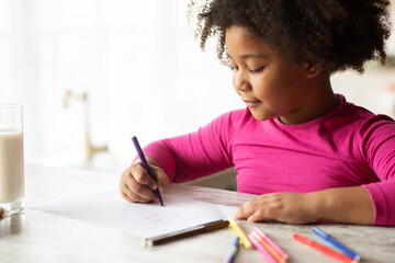 Children Development Activities. Cute Little Black Girl Drawing At Table In Kitchen