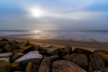 Foggy sunset in Hauteville-sur-Mer beach