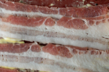Raw meat texture background closeup bacon.