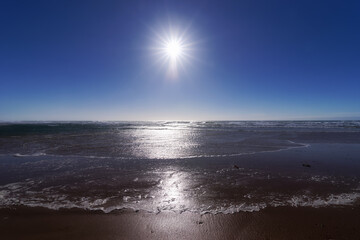 Clouds reflection in Barneville-Carteret beach