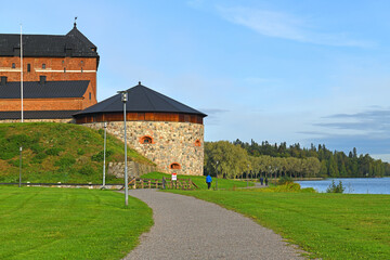 Medieval fortress on shoreline of picturesque lake Vanajavesi in Hameenlinna city, Finland